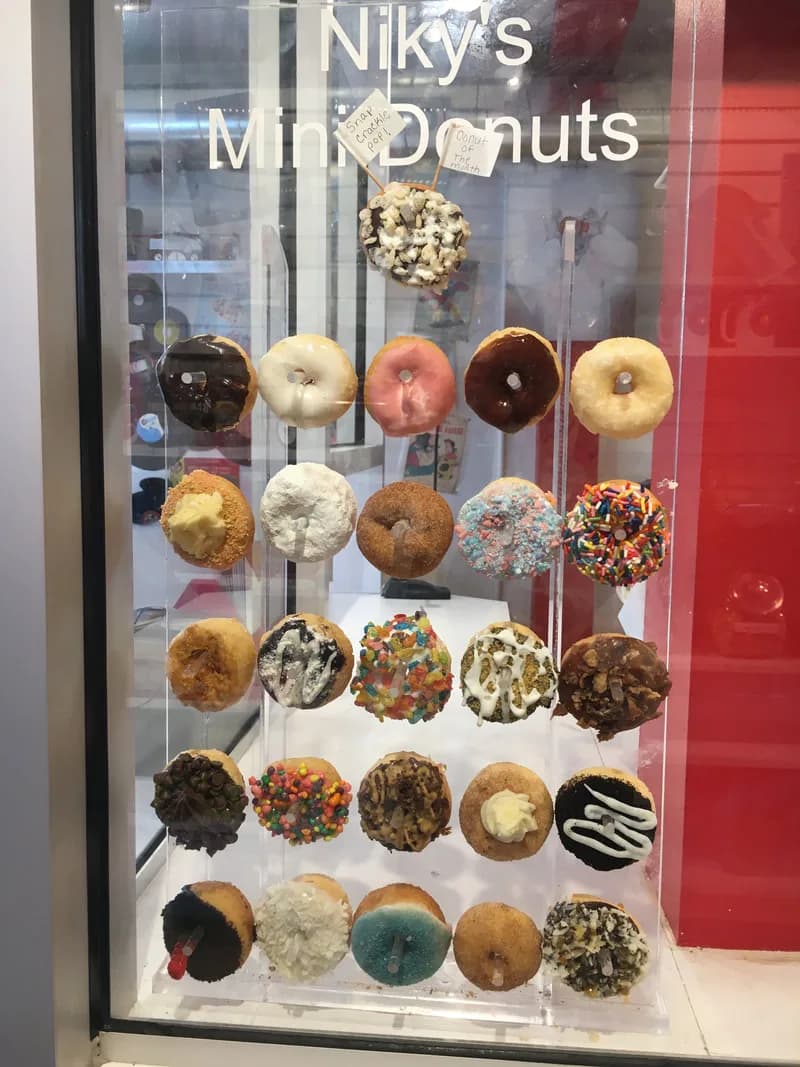 Niky's Mini Donuts colorful donut display wall
