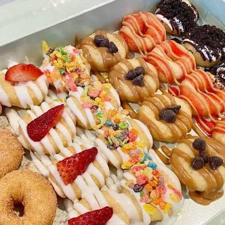 The Dapper Doughnut box of topped mini donuts